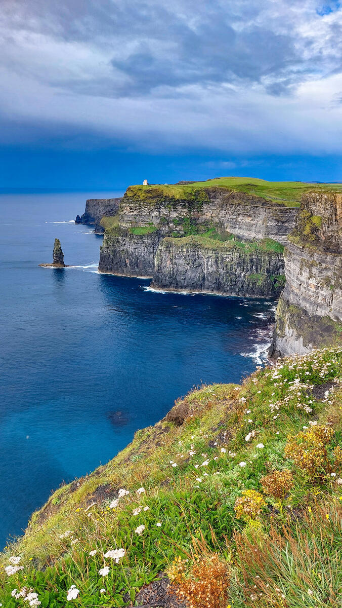 The Cliffs of Moher looking north toward O'Brien's Tower, with Branaunmore sea stack rising from the Atlantic below