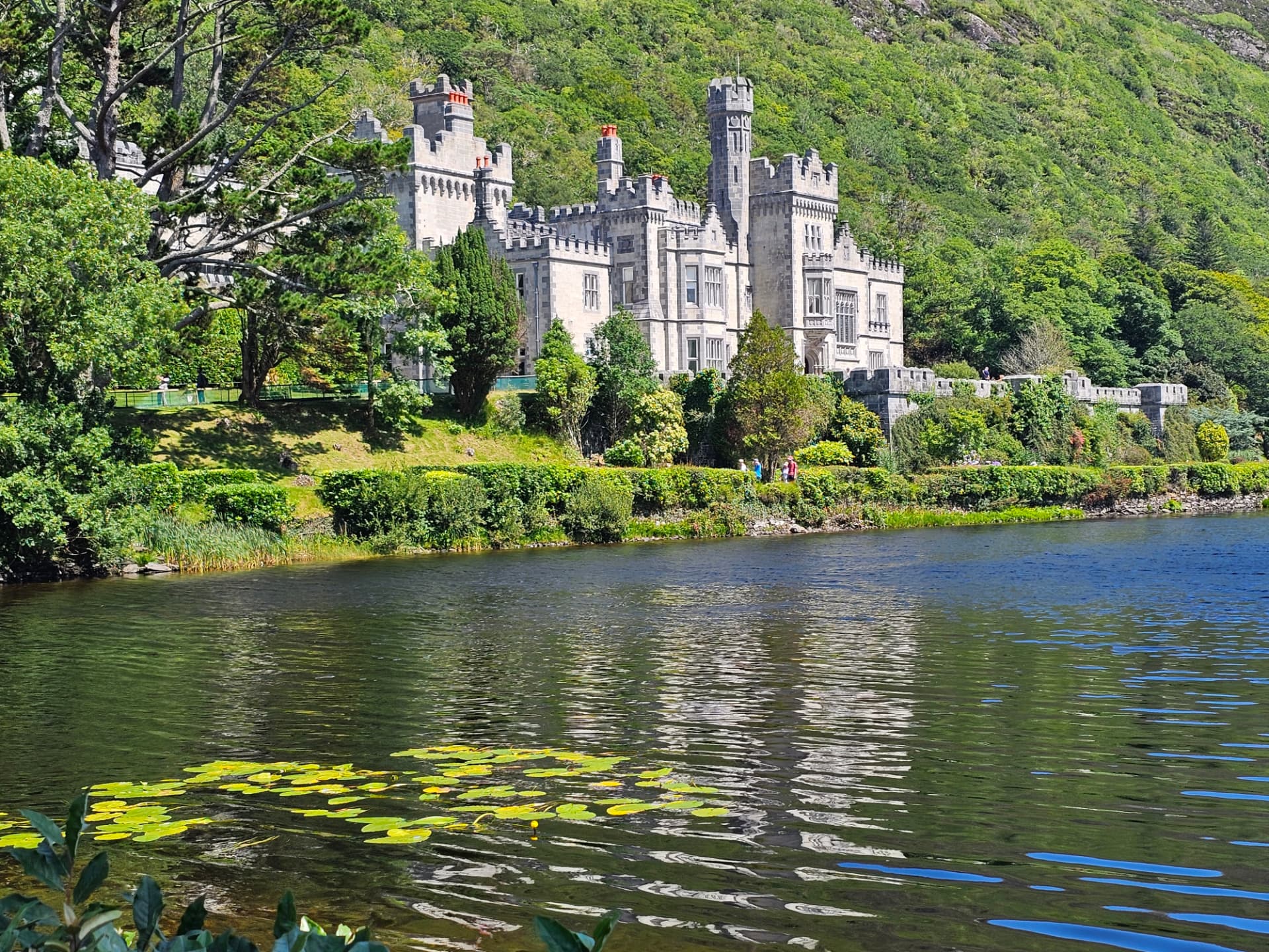 Kylemore Abbey on the shore of Pollacappul Lake, Connemara, Co. Galway
