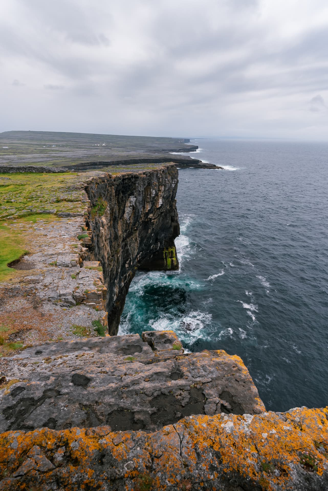 The stone ramparts of Dún Aonghasa on the cliff edge above the Atlantic, Inis Mór, Aran Islands