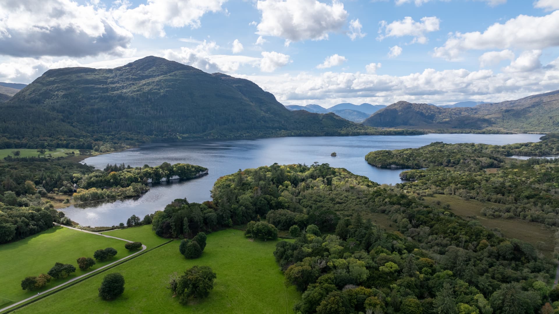 The Lakes of Killarney with forested islands and the McGillycuddy's Reeks beyond, County Kerry